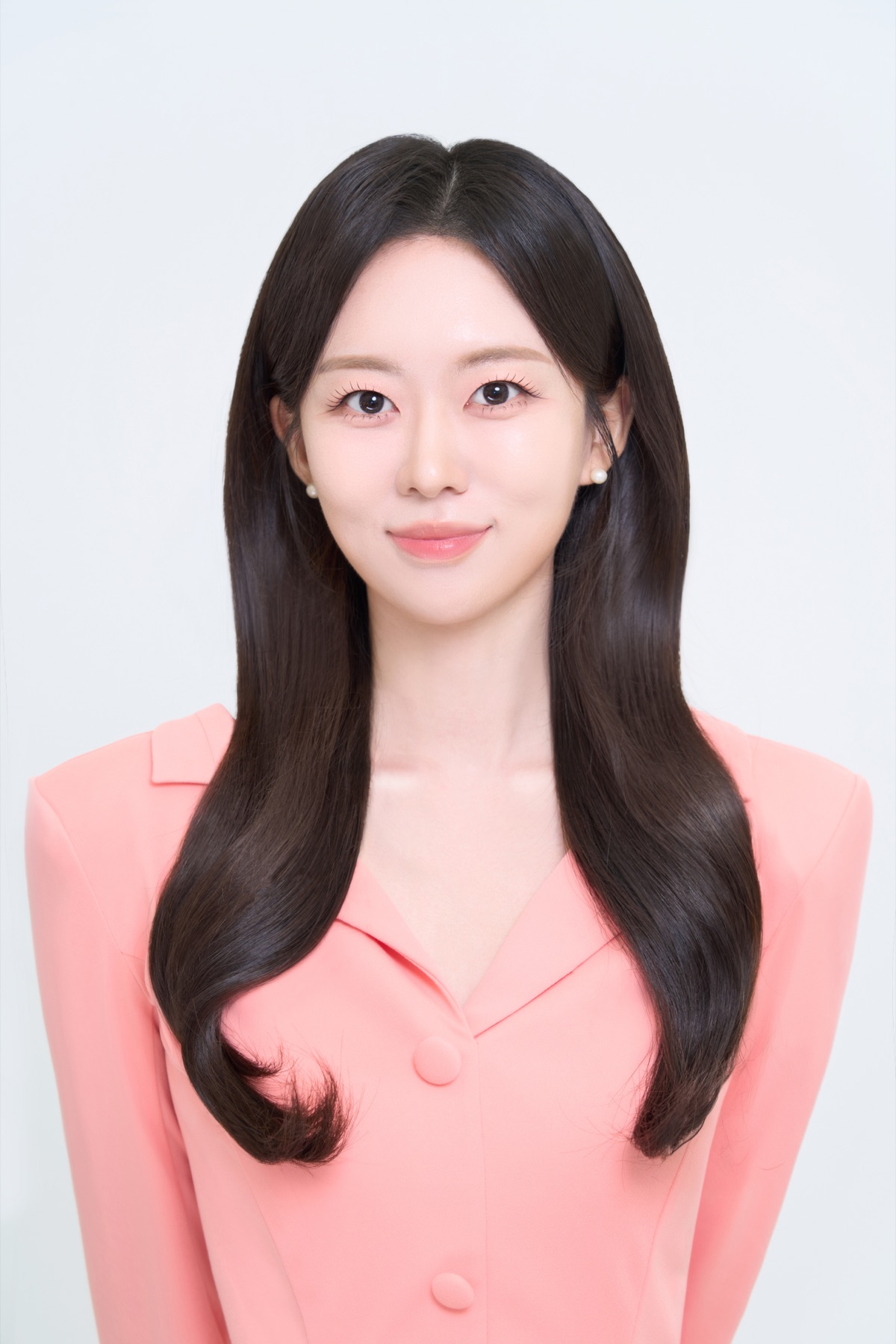 Chloe Lee in a coral jacket — broadcast announcer, Seoul